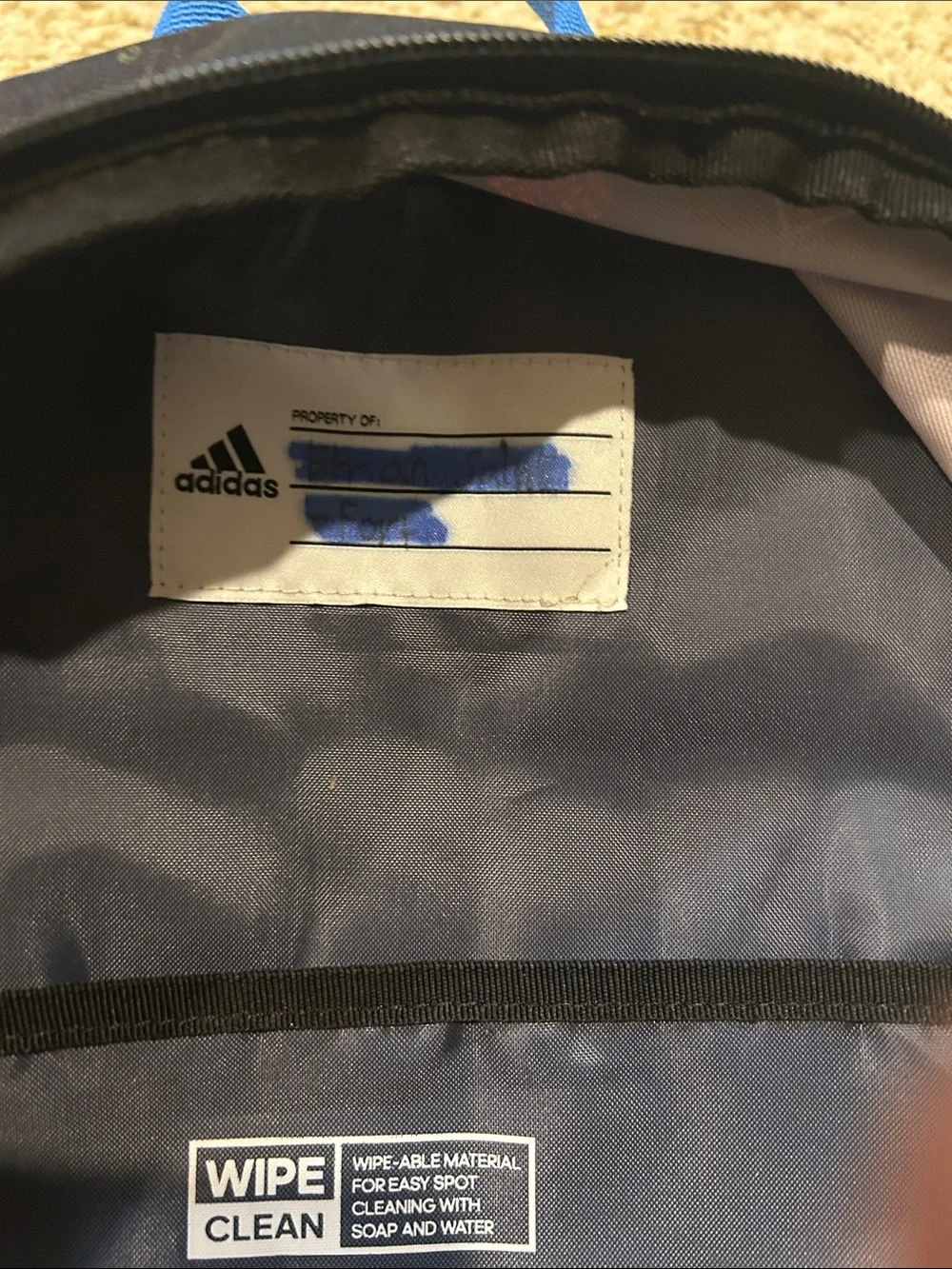 adidas Black Backpack with Bright Blue Stripes and Multicolor Icons